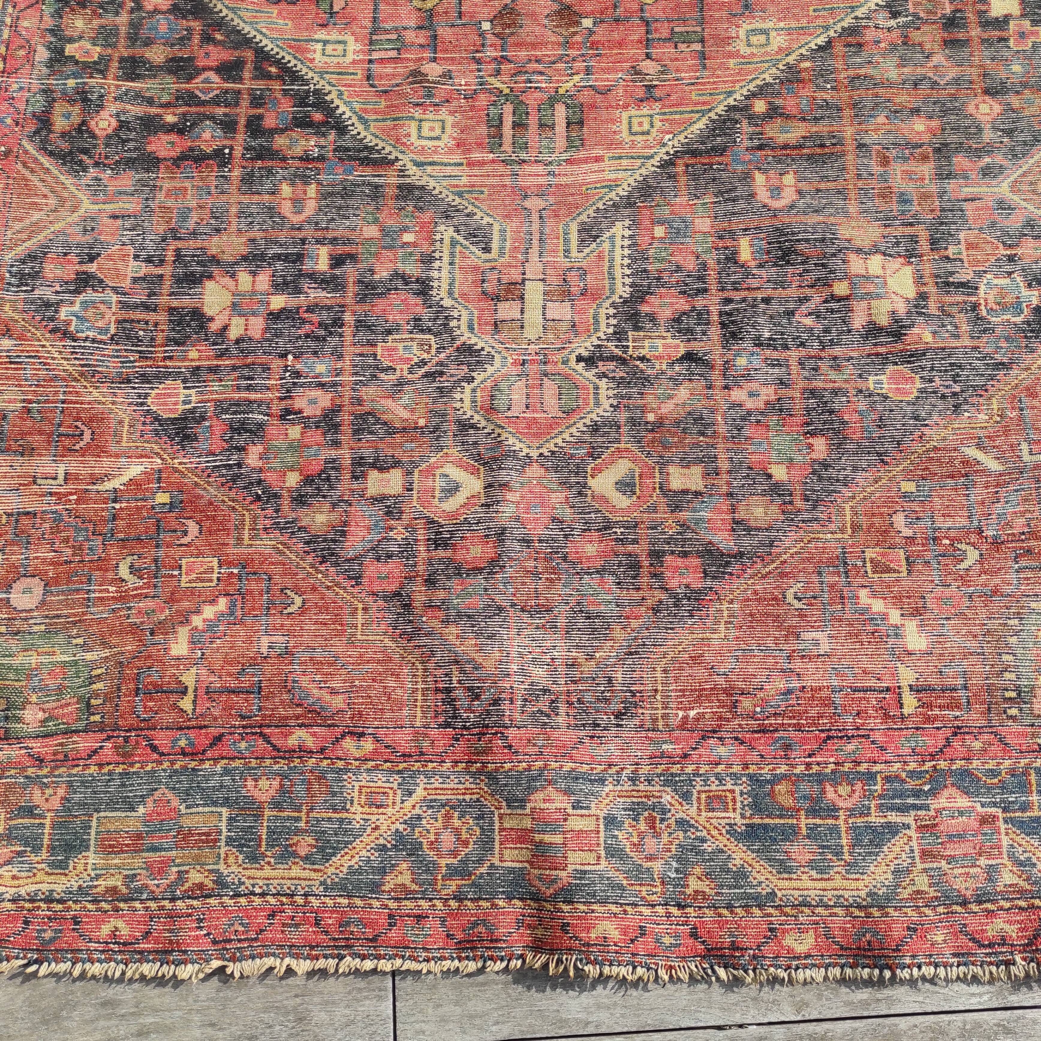 Old Persian carpet 1.62 m wide and 2.33 meters long