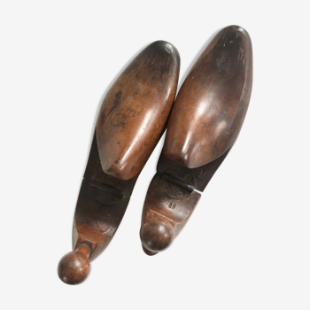 Pair of old solid wood shoes