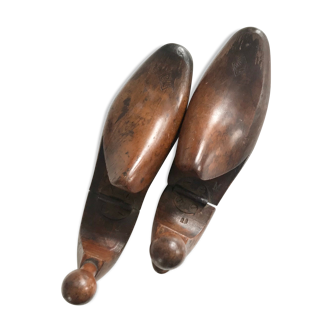 Pair of old solid wood shoes