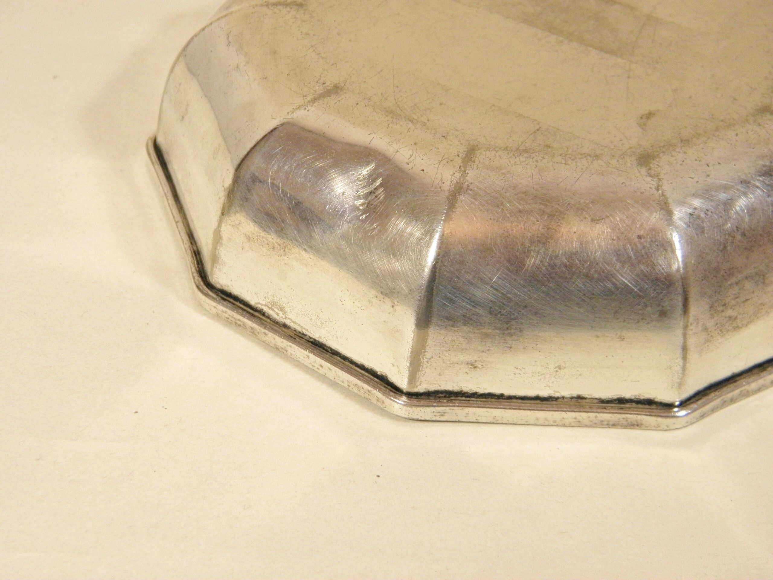 Silver empty-pocket cup