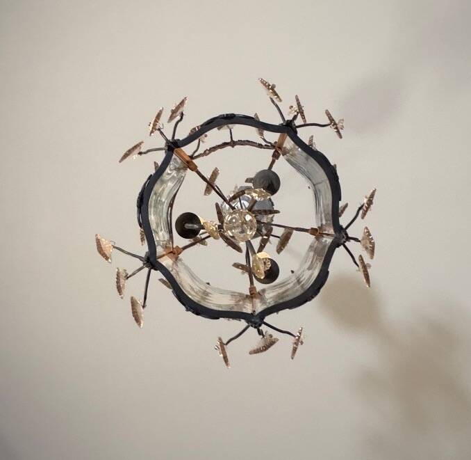 Louis XV style lantern in blackened brass adorned with cut crystal pendants, circa 1900.