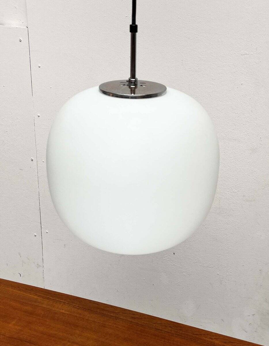Minimalist suspended glass ball lamp from the vintage German space age by Glashütte Limburg, 1970s.
