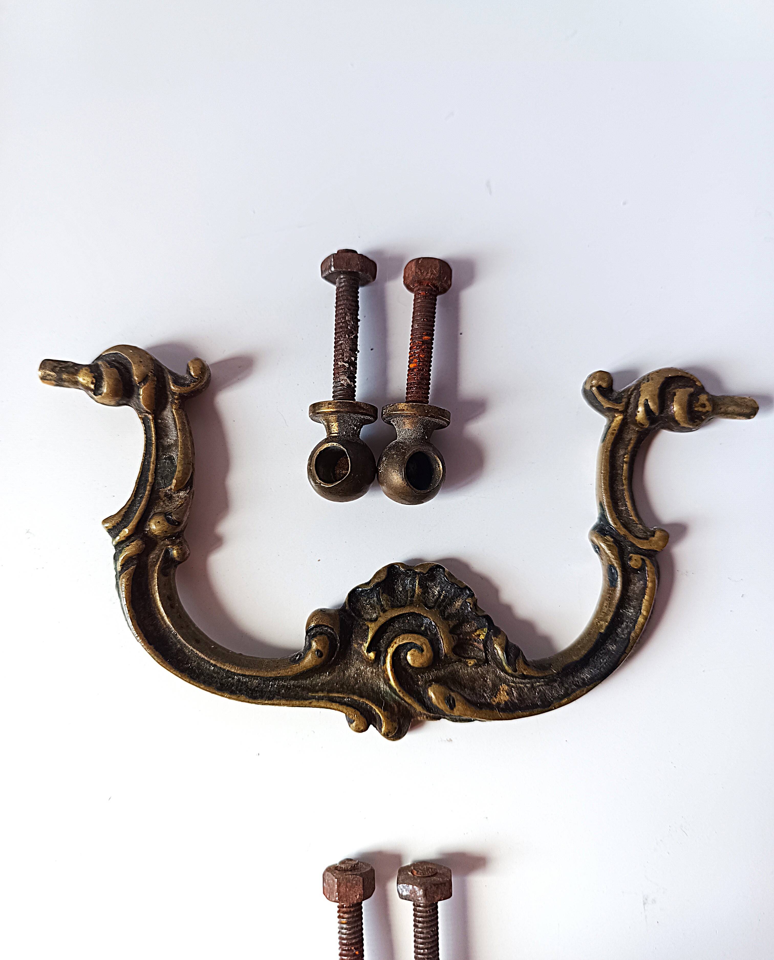 Antique pair of bronze drawer handles.