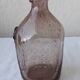 Biot bottle in bubbled glass