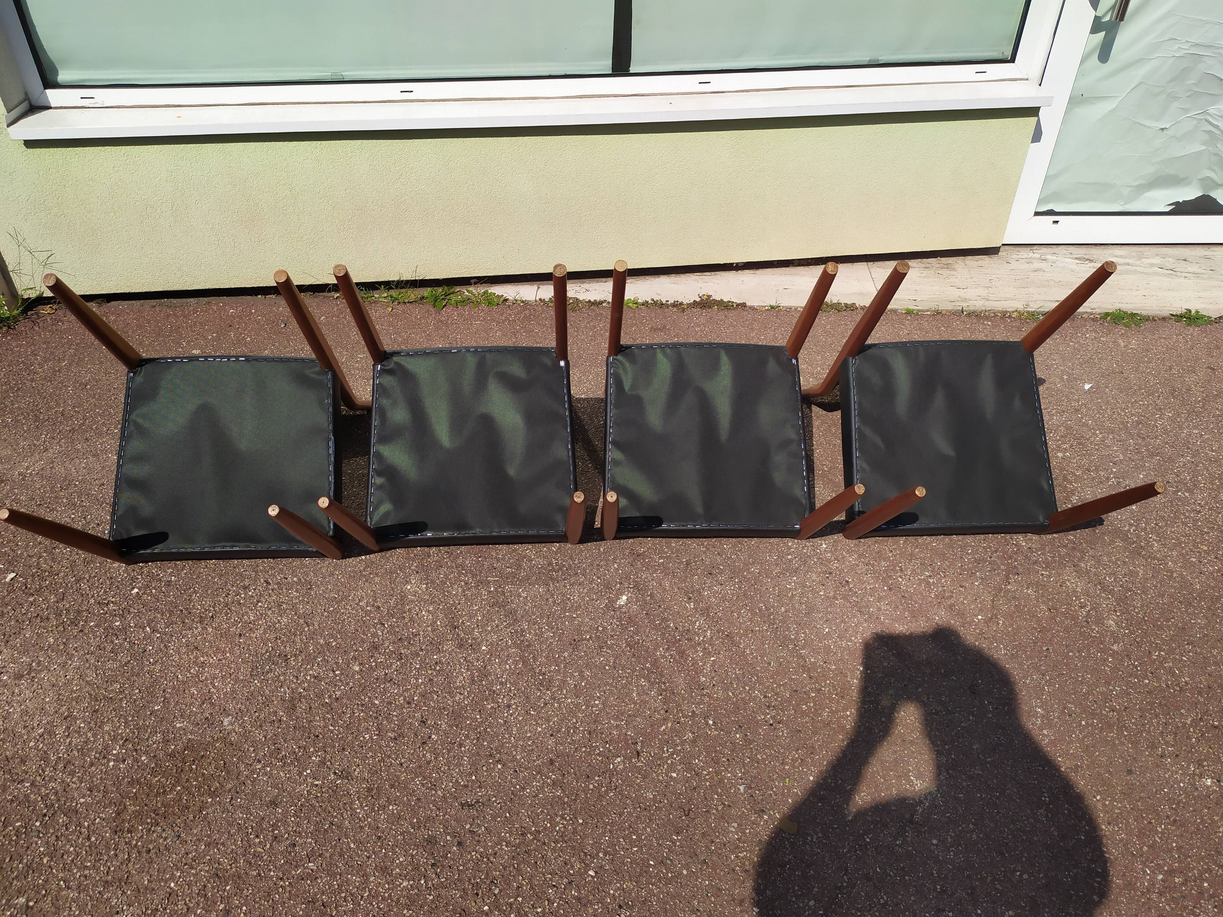 Set of 4 Scandinavian teak chairs in black leather