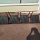 Set of 4 Scandinavian teak chairs in black leather