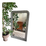 Antique mirror in stucco and wood