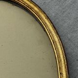 Old oval shaped wooden frame