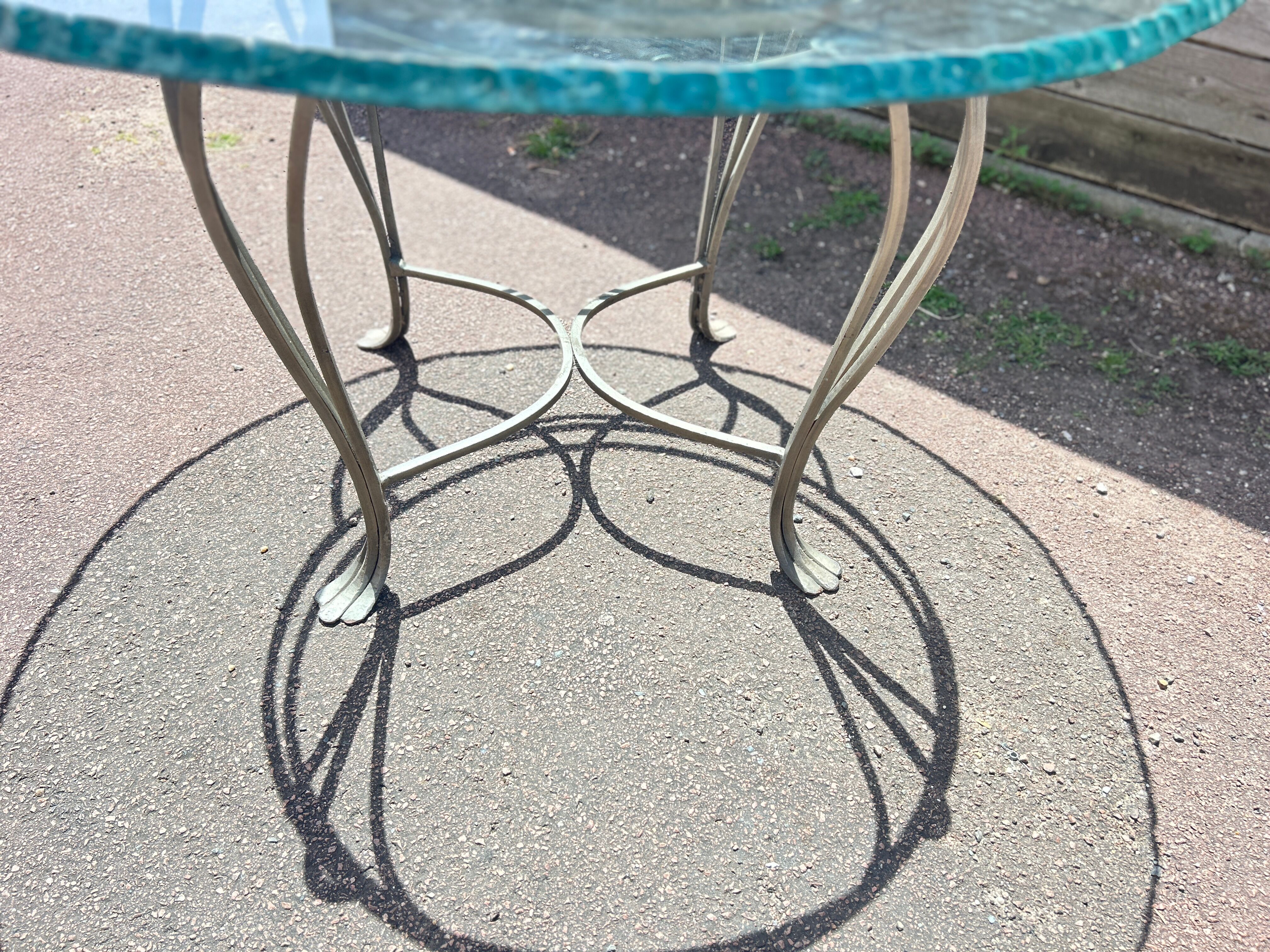 Table ronde en verre et fer forgé