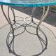 Table ronde en verre et fer forgé