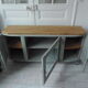 Art Deco furniture revisited in gray green and placed on wheels.