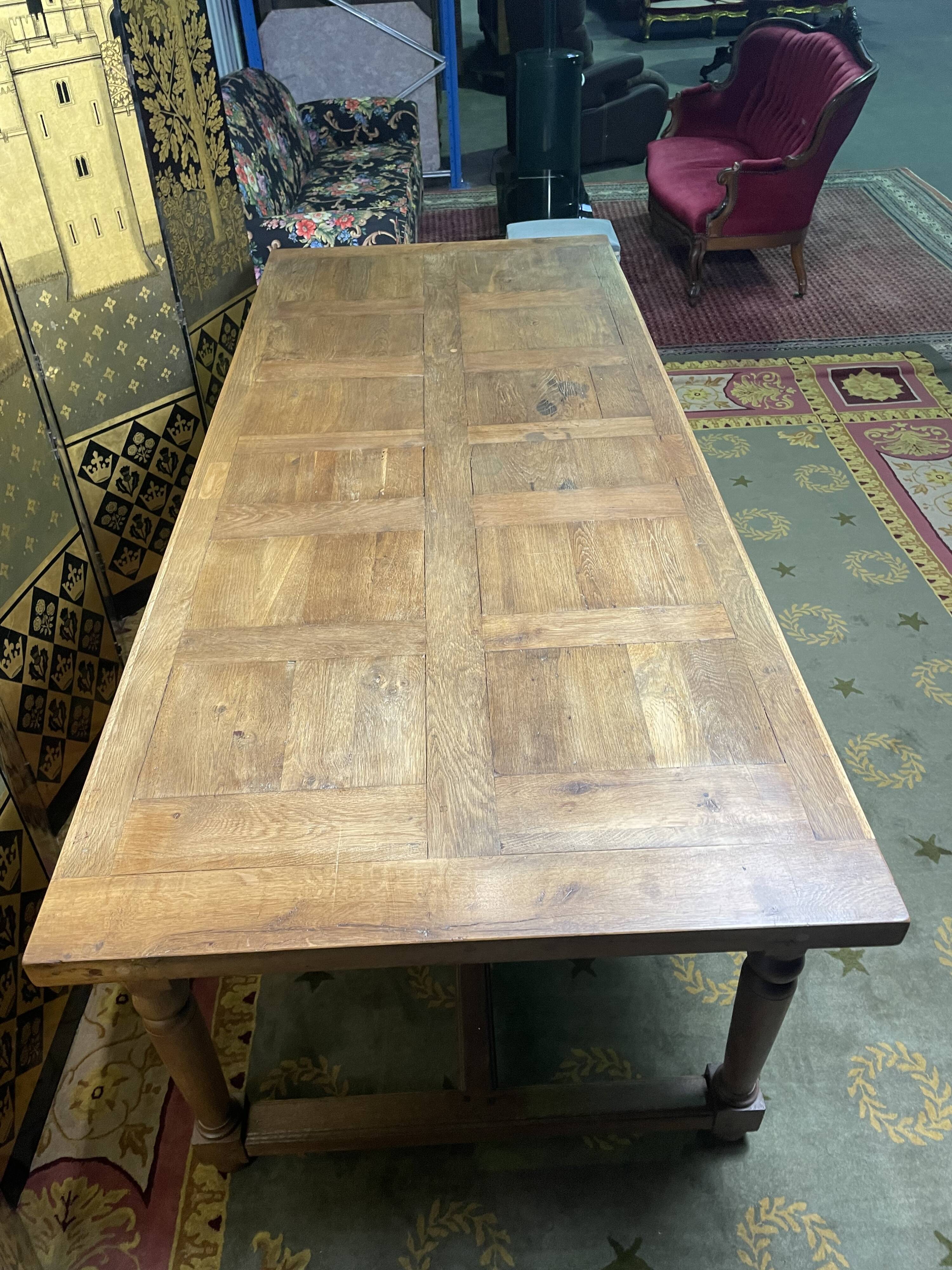 19th century oak farmhouse table with parquet flooring