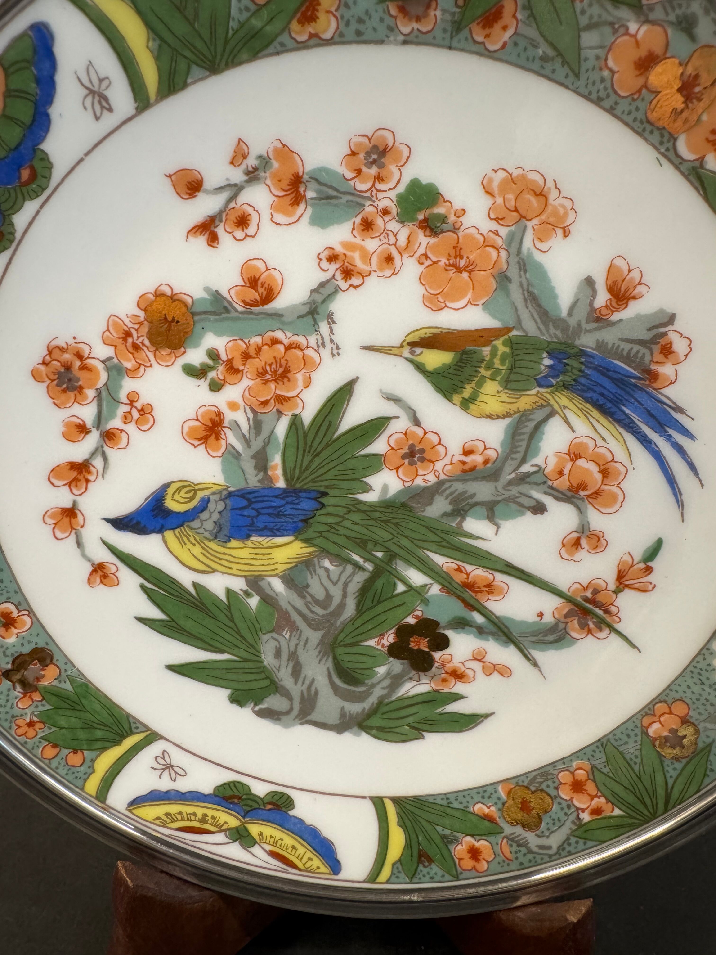 Two Raynaud Limoges plates and Tetard brothers silver.