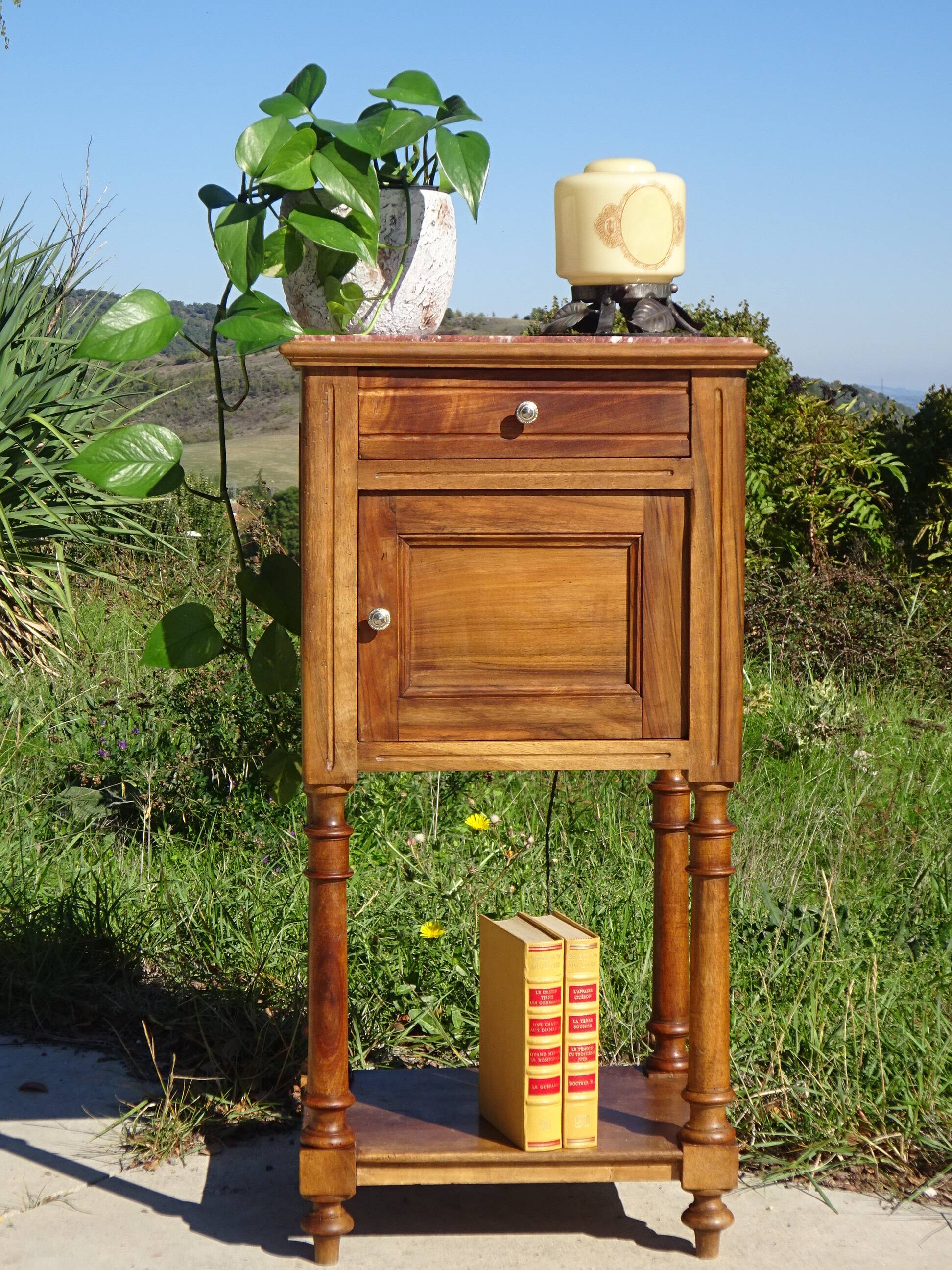 Antique Louis XVI style bedside table in walnut, with a marble top.