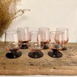 6 small pink glasses with black stem