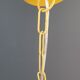 Mustard-coloured metal mesh suspension