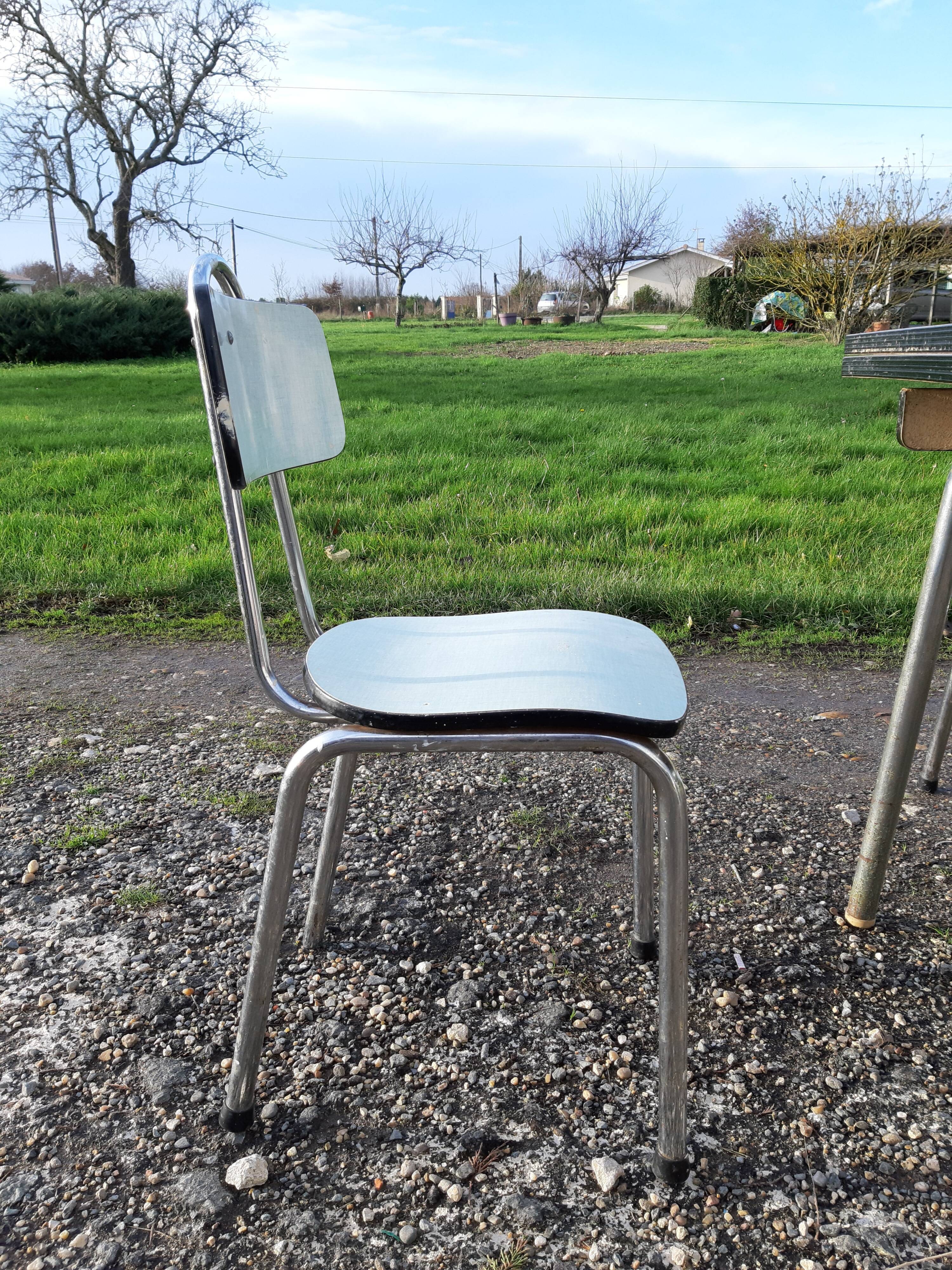 Table et 4 chaises formica vintage de marque Colmon