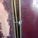 Antique French gilt metal triptych vanity mirror with floral crest