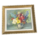 Still life of flowers in Impressionist style with a golden frame.