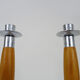 Paire d'anciens bougeoirs fusée design post moderniste en bois et inox. année 70 80