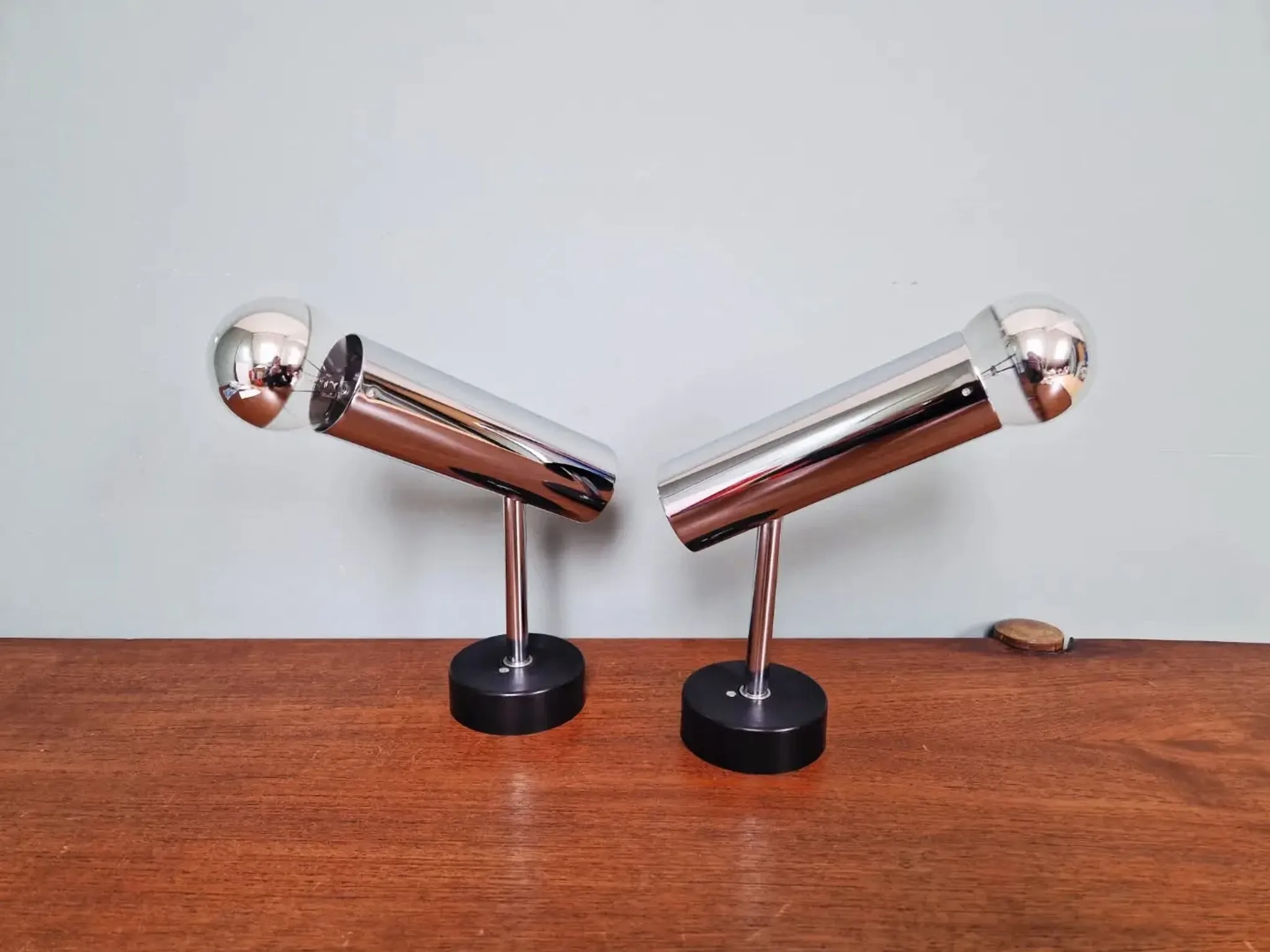Pair of chrome metal wall lights, Staff Leuchten, Germany, 1970.