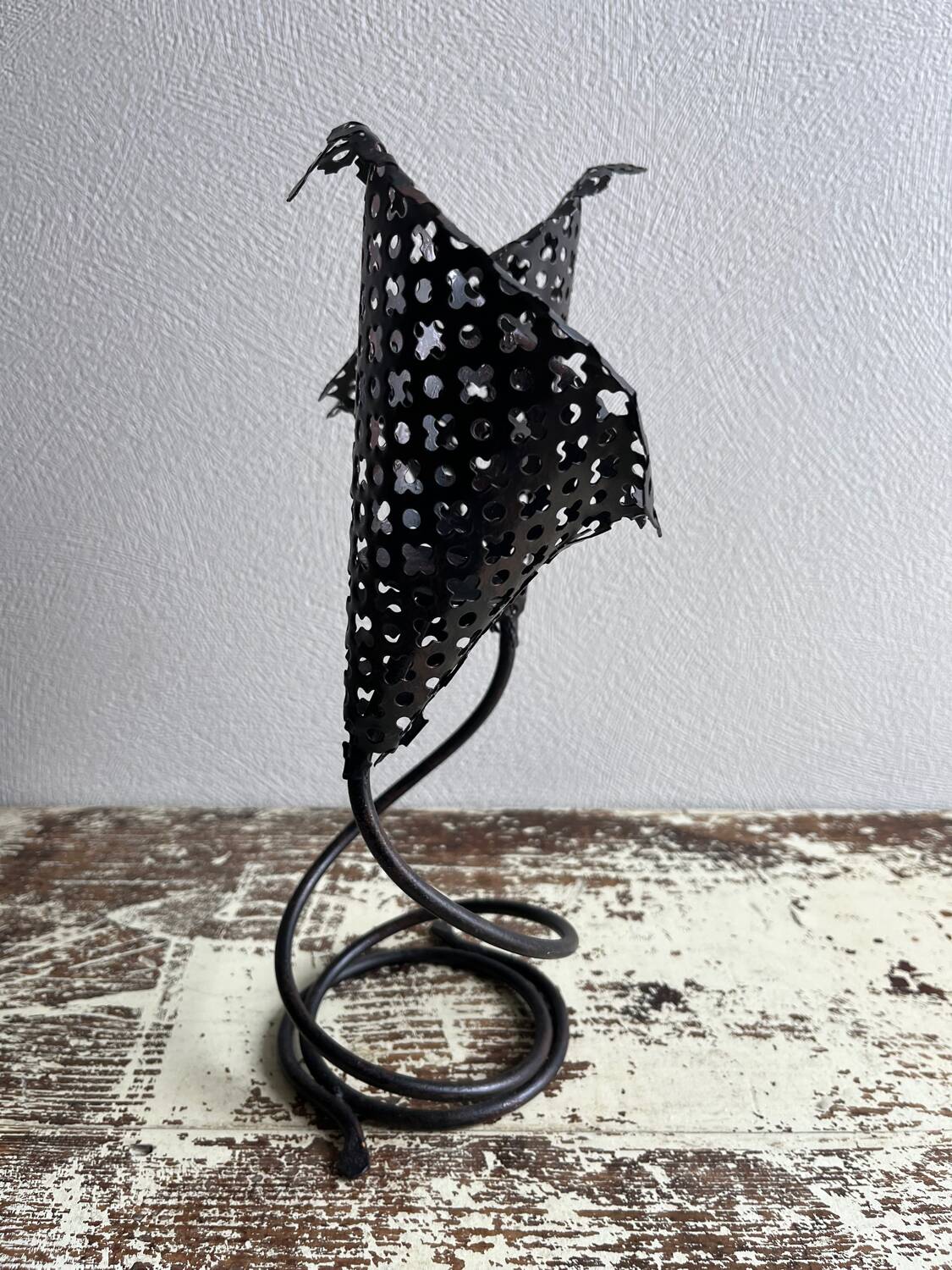 Perforated metal tealight candle holder