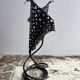 Perforated metal tealight candle holder