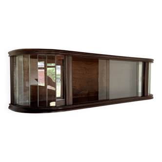 Vitrine suspendue subtile avec éléments en verre taillé