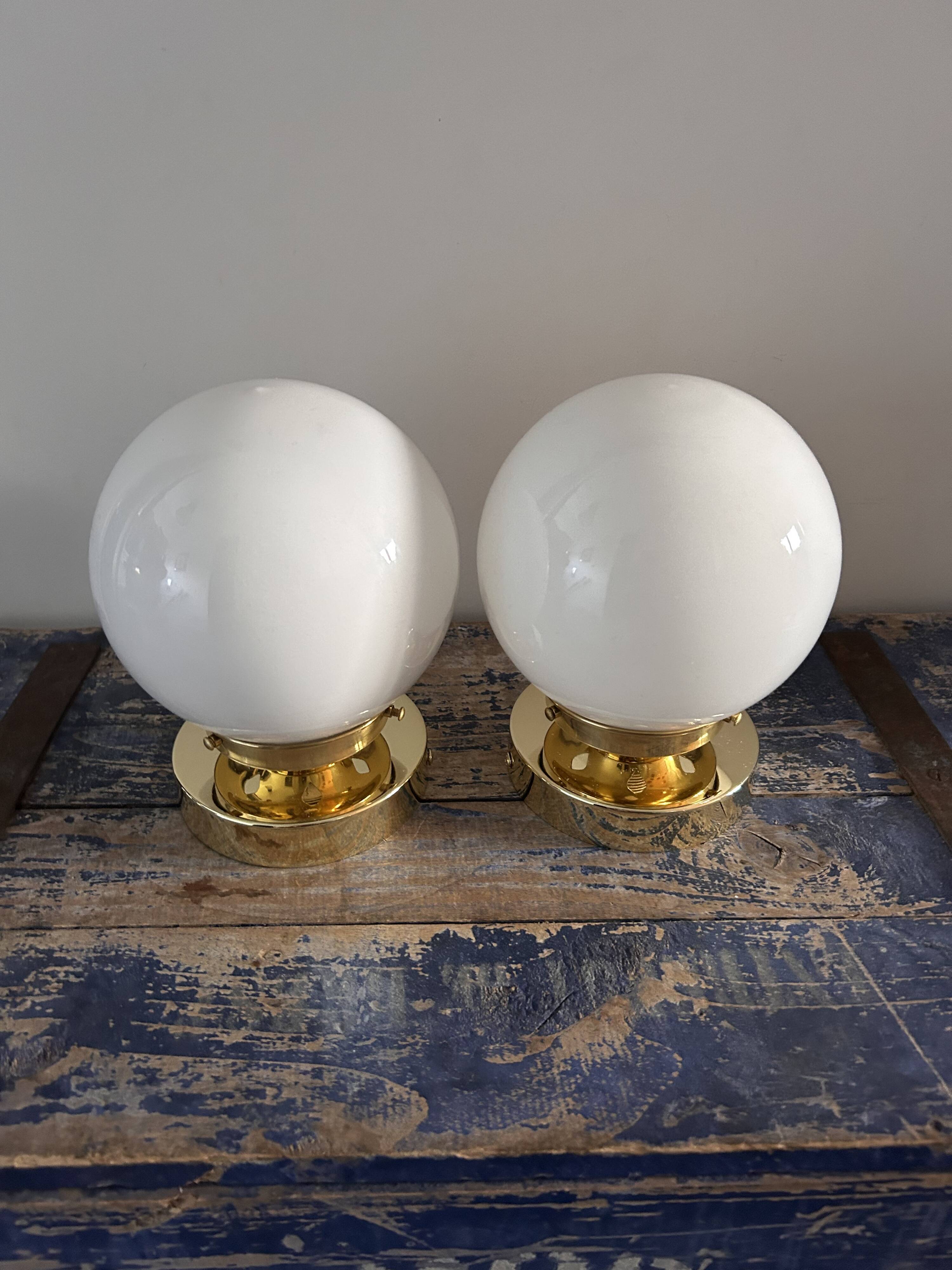 Set of white opaline globe sconces
