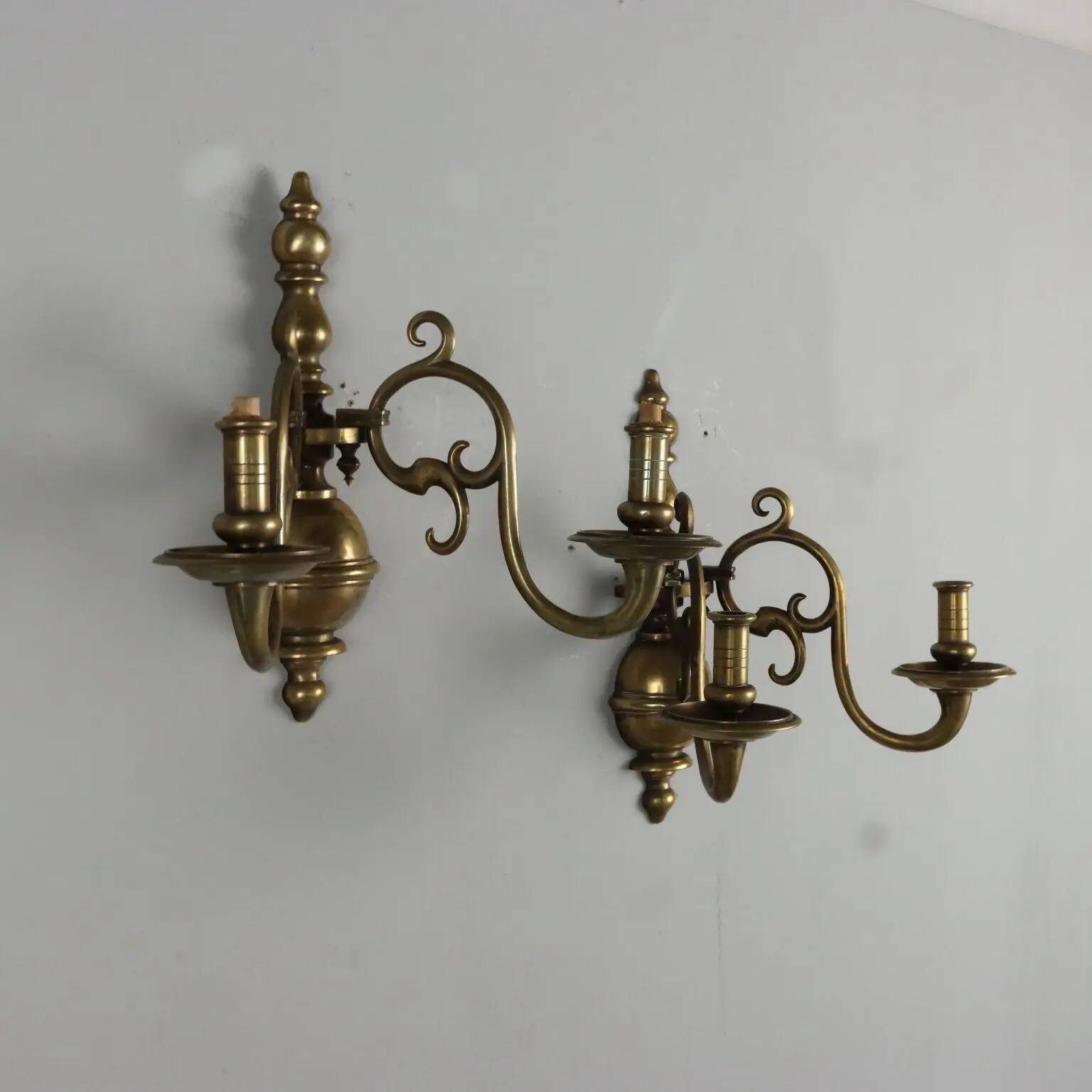 Pair of antique wall sconces in 20th-century Baroque style.