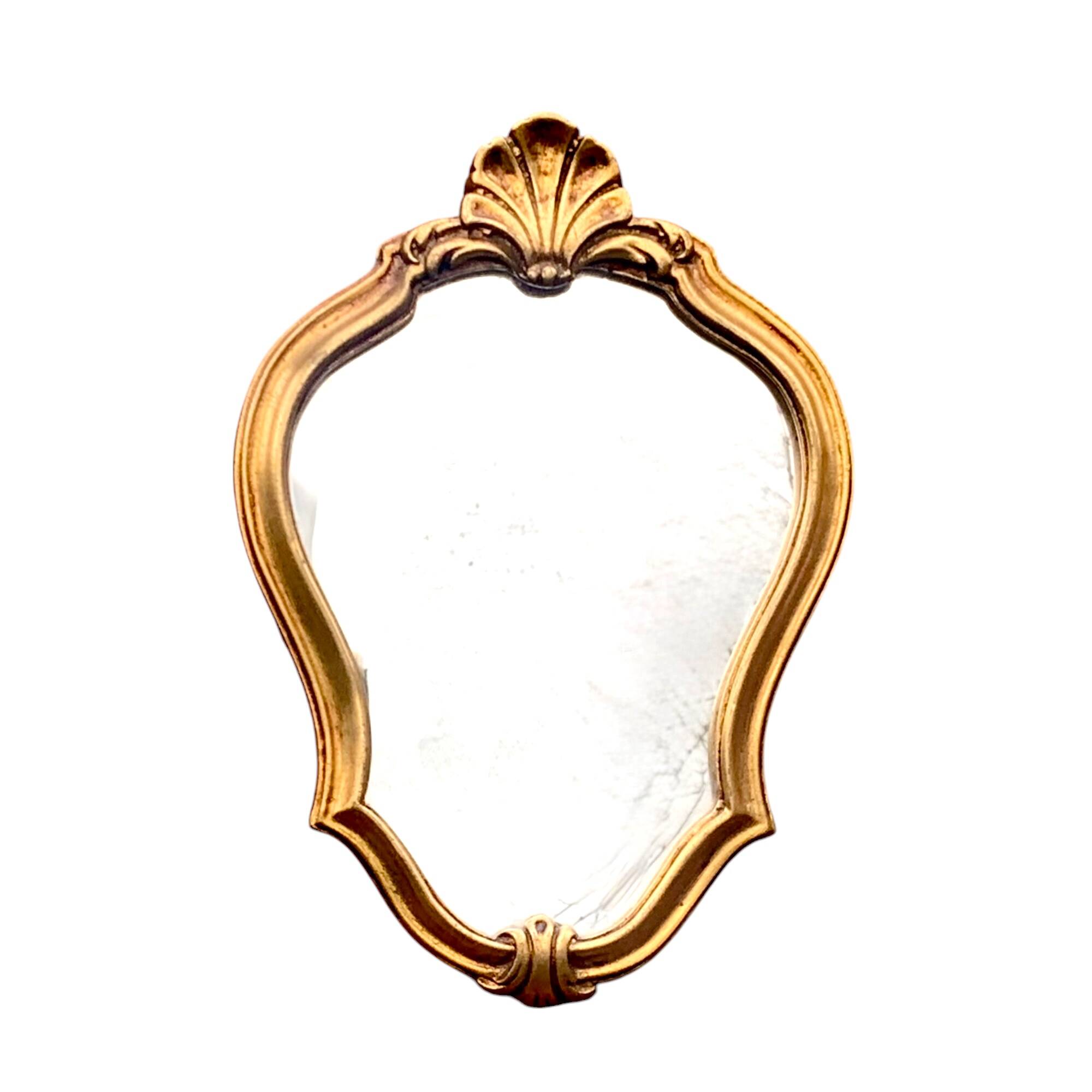 Petit miroir mural rocaille vintage en résine dorée
