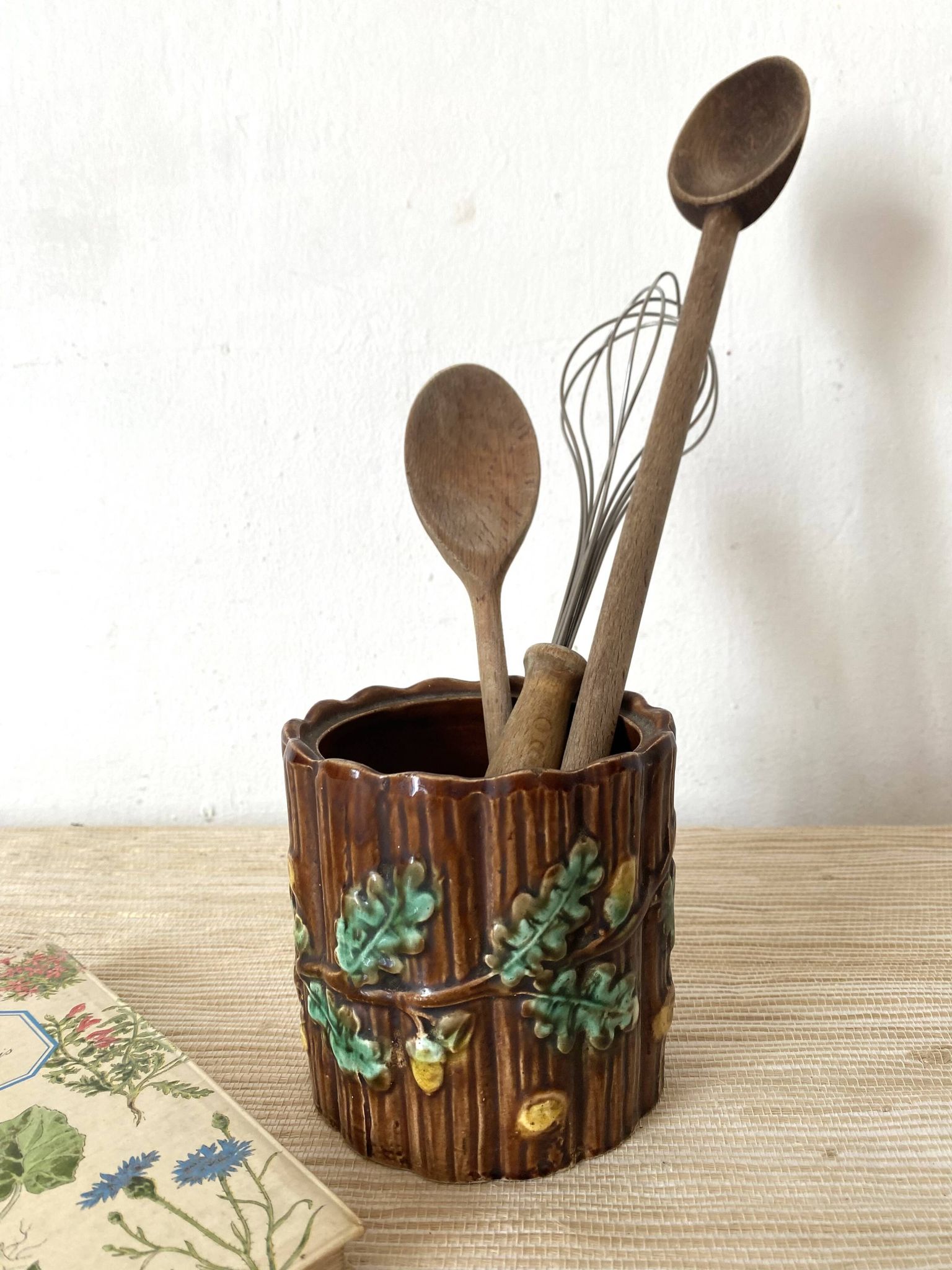 Antique slip pot with acorn decoration