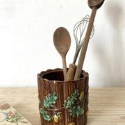 Antique slip pot with acorn decoration