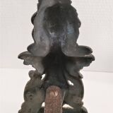 Pair of bronze andirons with black patina, 19th century, female caryatids