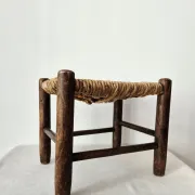 Small rustic vintage wooden and straw stool -