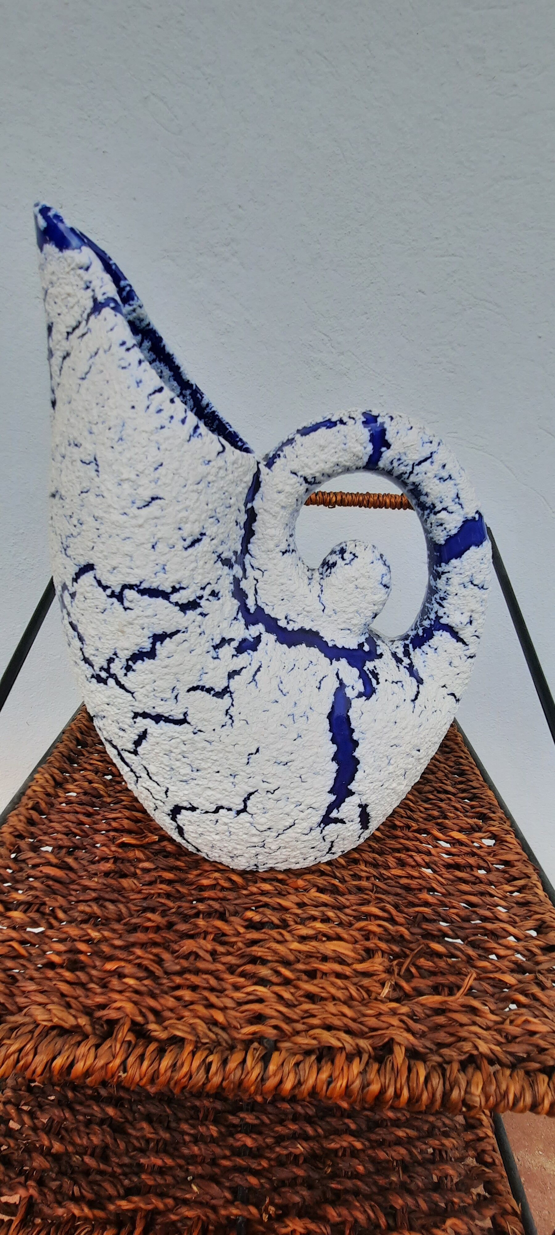 Blue and white ceramic pitcher