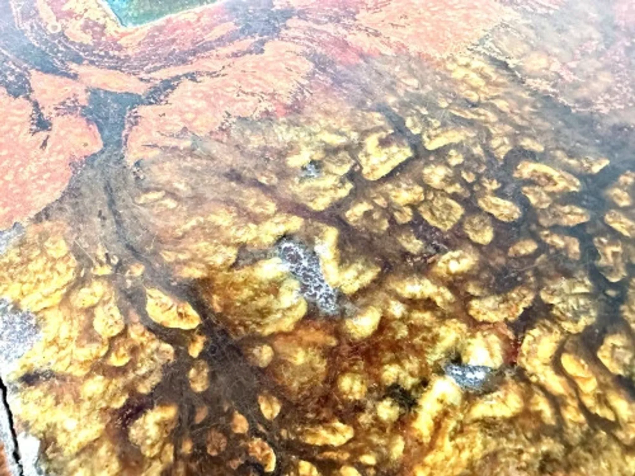Coffee table by Robert and Jean Cloutier in enamelled lava and metal, 1950s.