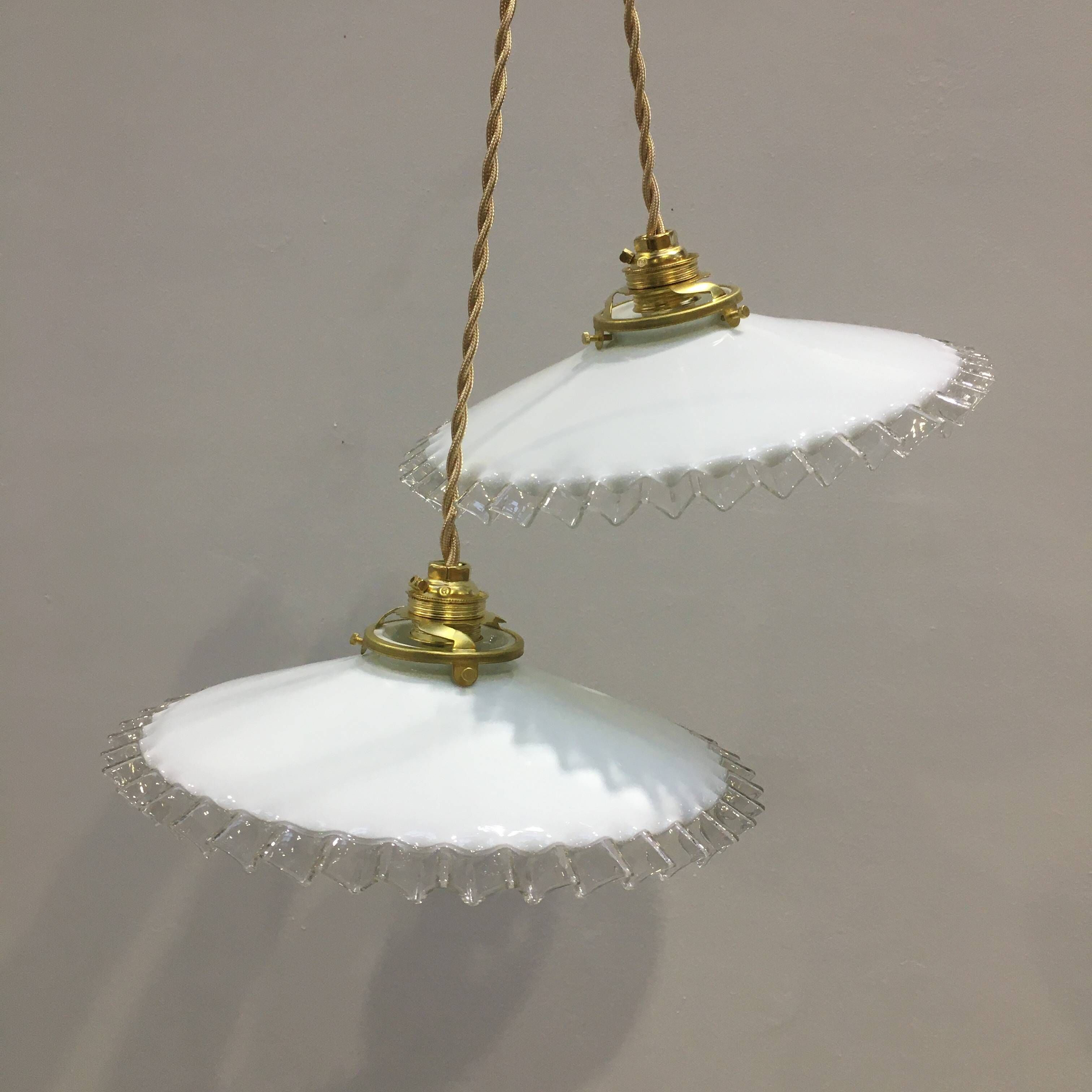 Pair of vintage pendant lights in white opaline and transparent serrated edges