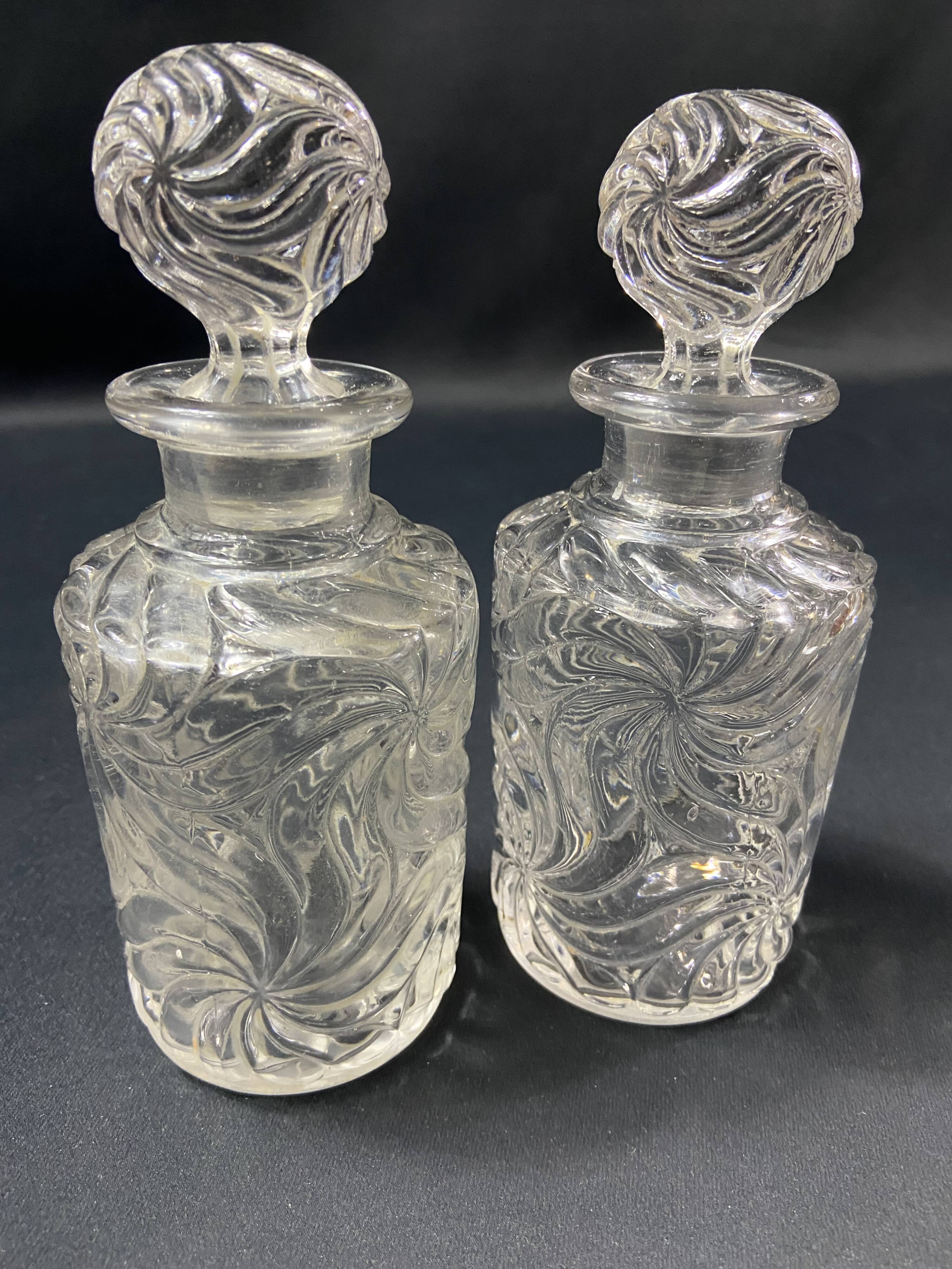 Pair of early 20th century SAINT LOUIS crystal perfume bottles, Fleurs de viole model
