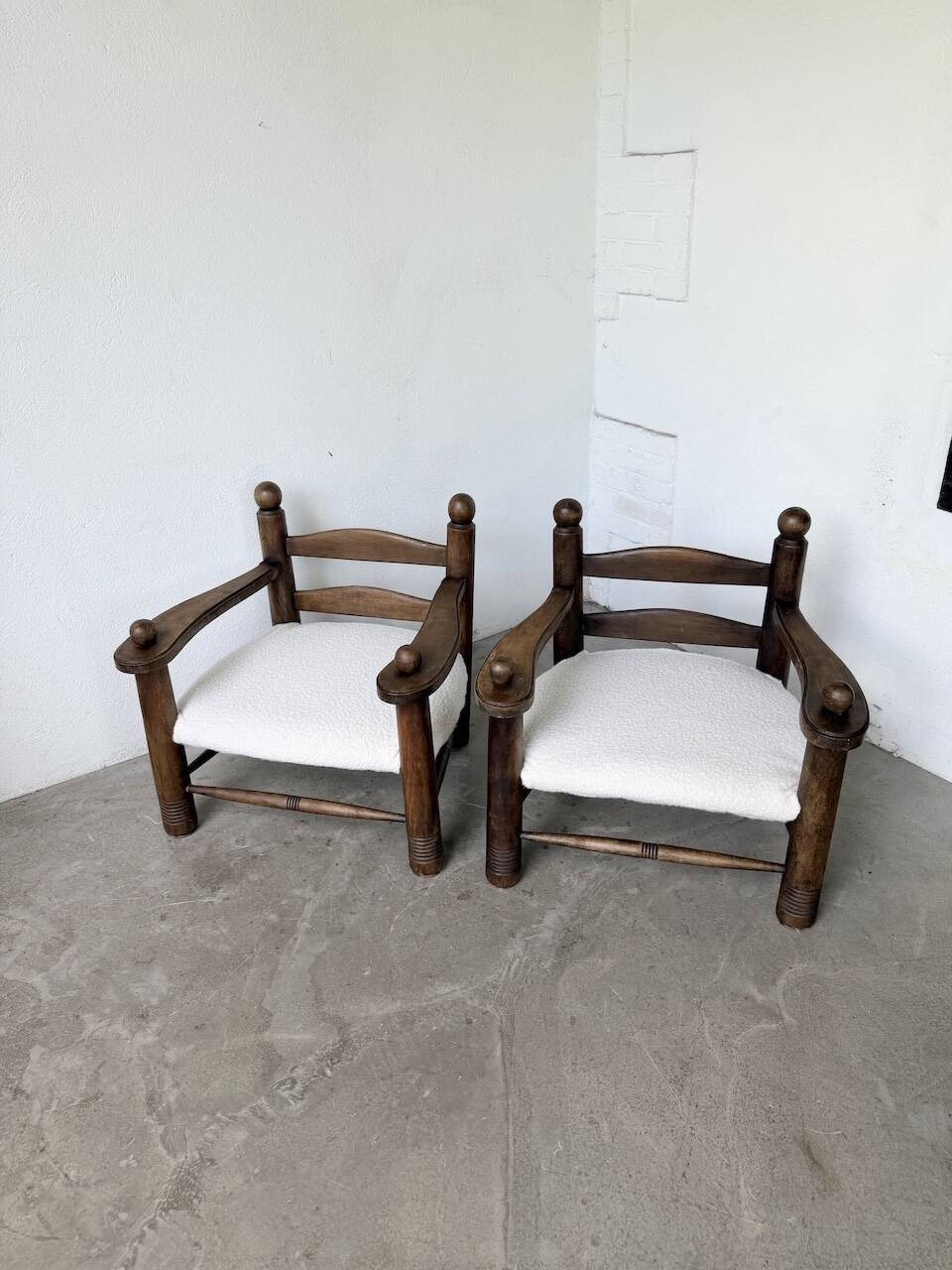 Pair of Dudouyt armchairs from the 1950s, oak.