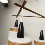 Scandinavian triangle pendant light in cascade with 3 opalines