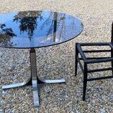 Adjustable round table in steel and glass