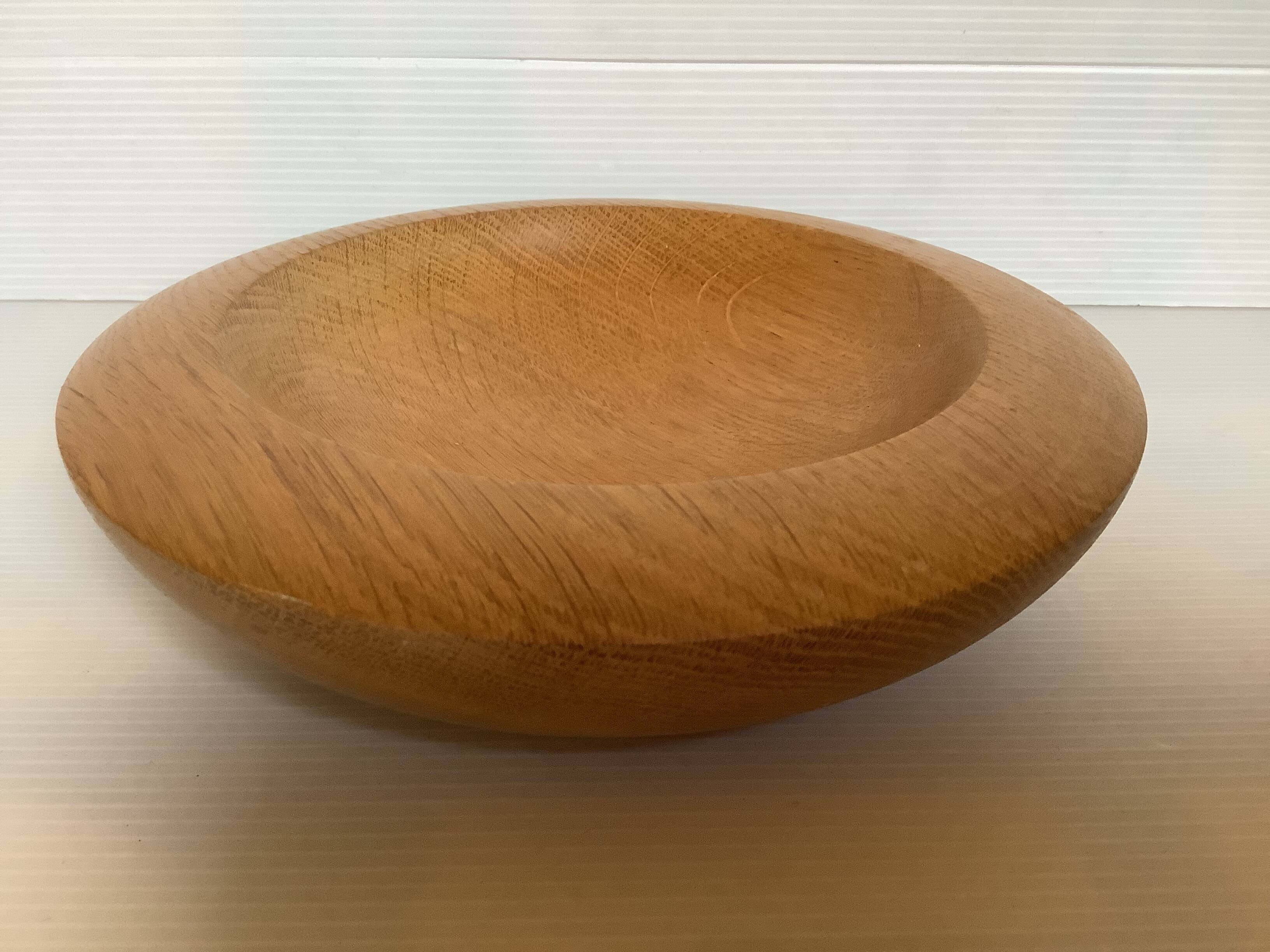 Scandinavian wooden pocket emptier