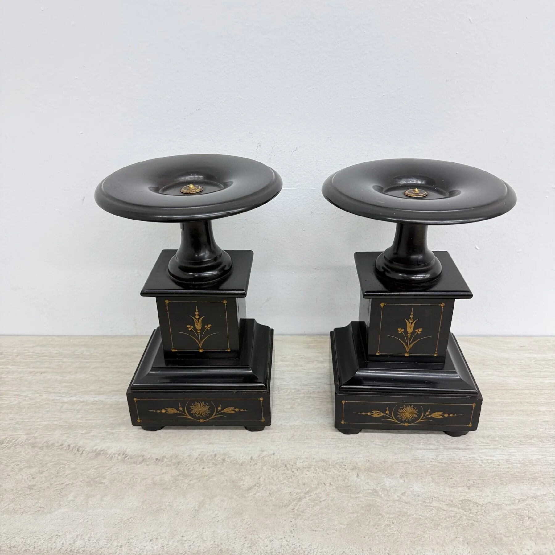Antique French black marble cassoulets gilt decor pedestals neoclassical pair, 1900s