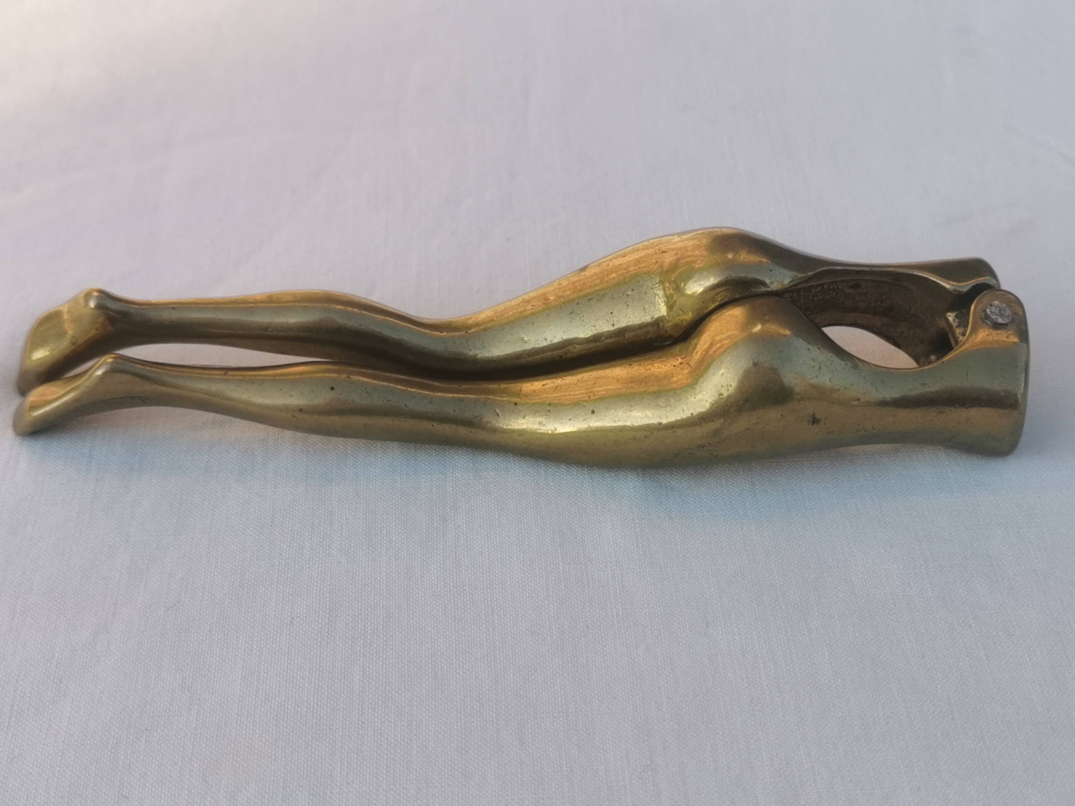 “woman’s legs” nut cracker in bronze