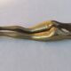 “woman’s legs” nut cracker in bronze