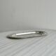 Small vintage oval tray in shiny lightweight metal