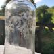 Two antique engraved glass bottles