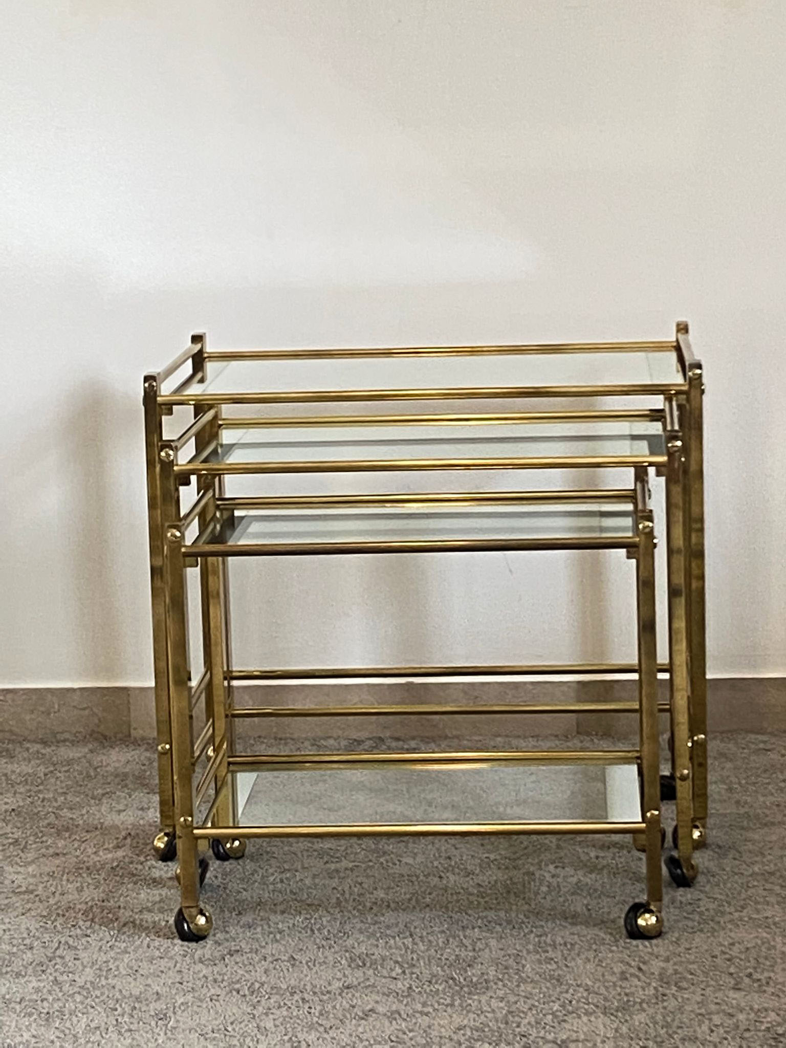 Trio of coffee tables "Nido" brass and glass Italy 70s