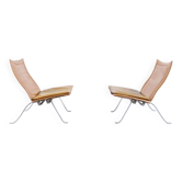 Imposante paire de fauteuils cuir et acier années 60'